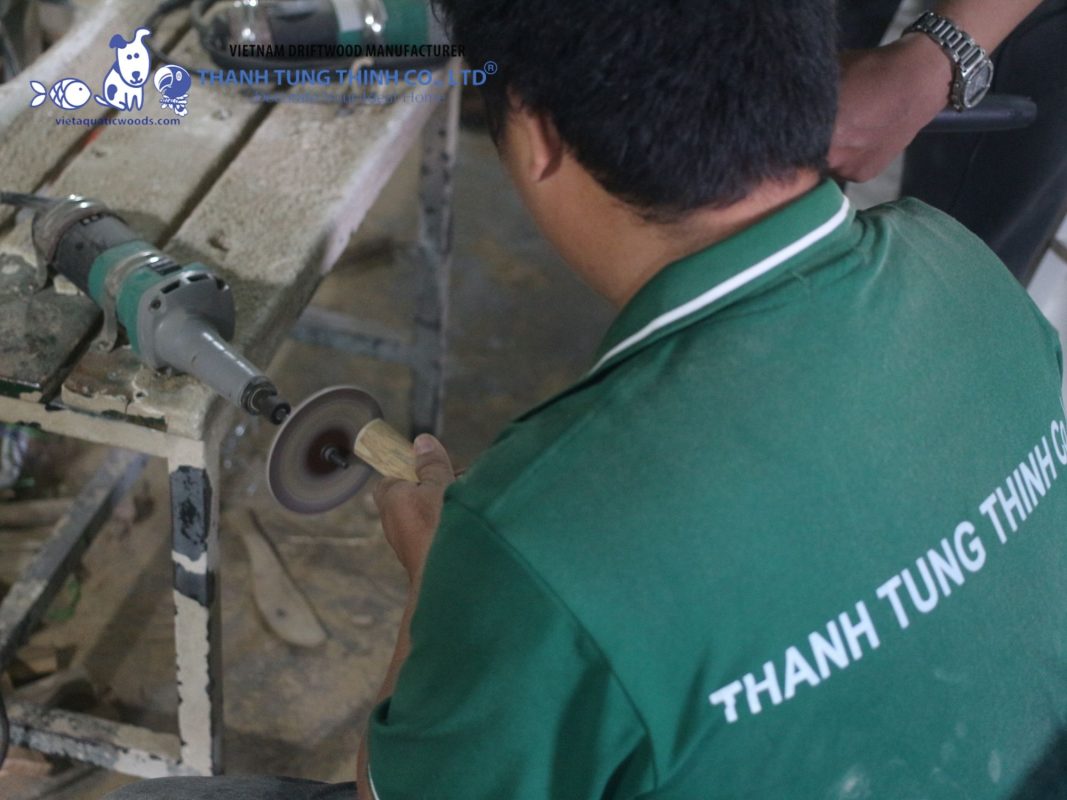 Skilled local craftmen carefully shape and refine the wood