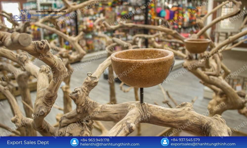 Detailed view of a coffee wood perch featuring a feeding bowl from a Coffee Wood Bird Perch supplier