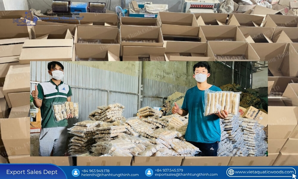 workers showcasing packed products meeting monthly supply capacity for coffee wood dog chews
